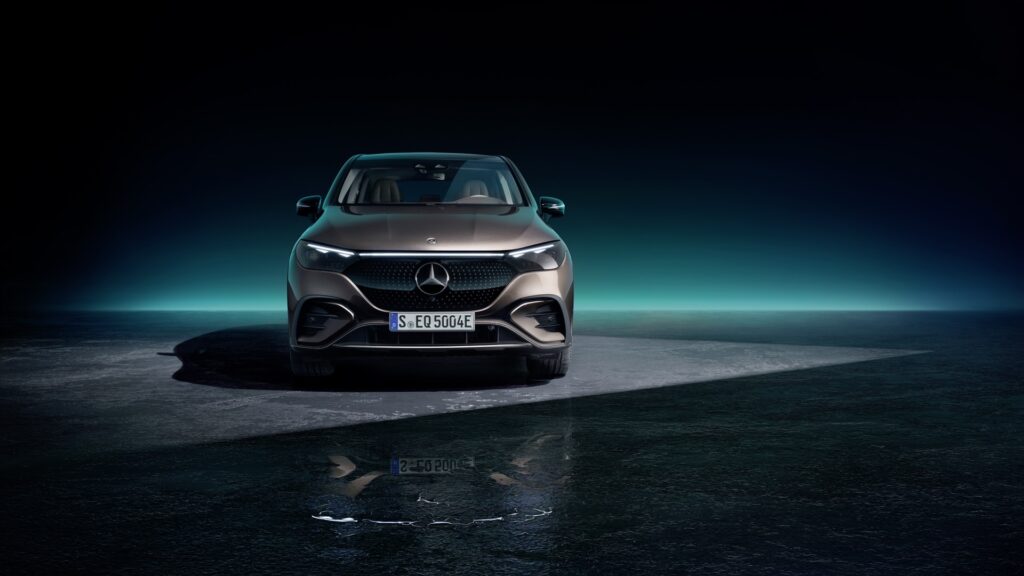Mercedes EQE SUV 350+ front studio shot showing the closed grille and light bar