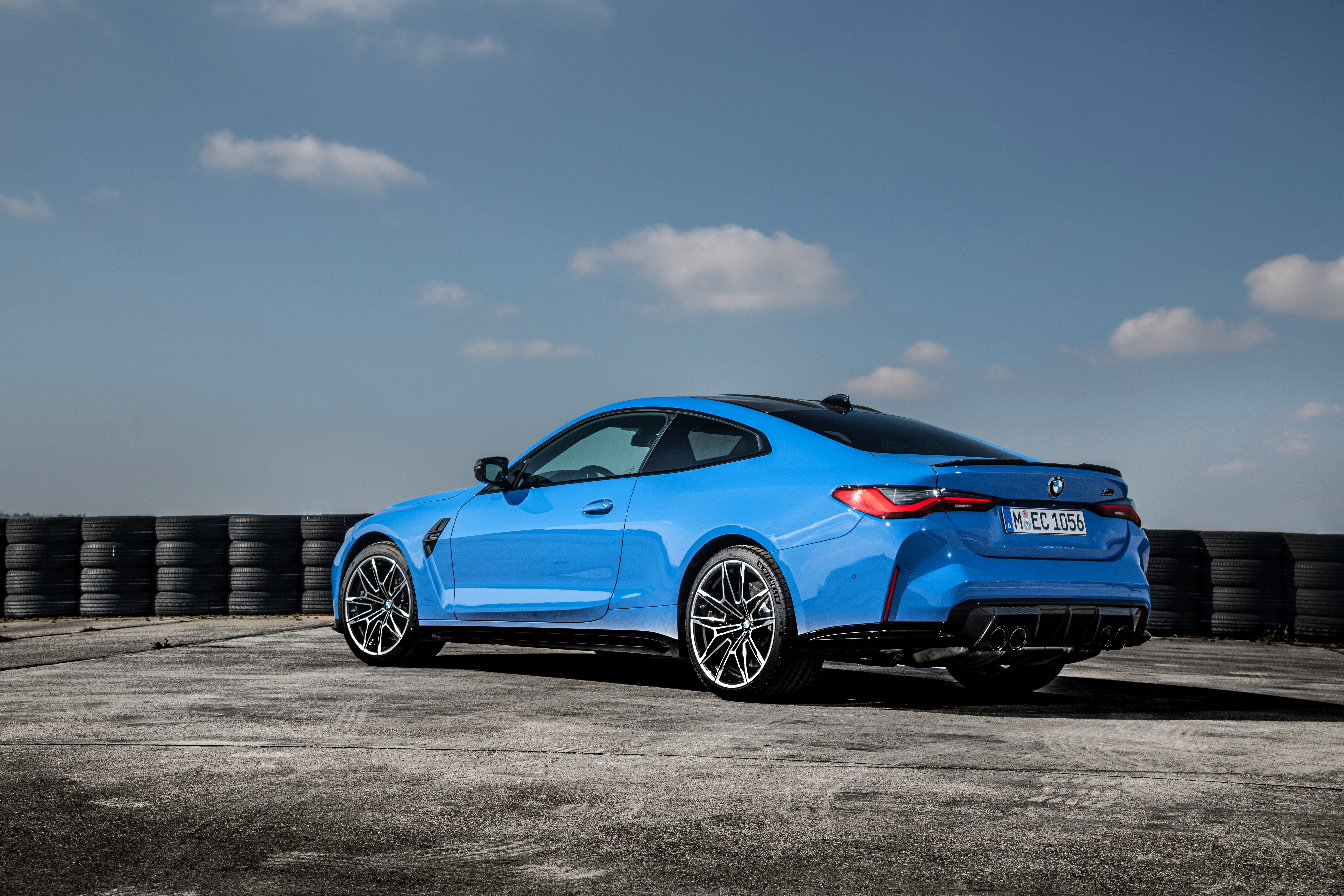 BMW M4 G82 Competition coupe rear three-quarter press shot