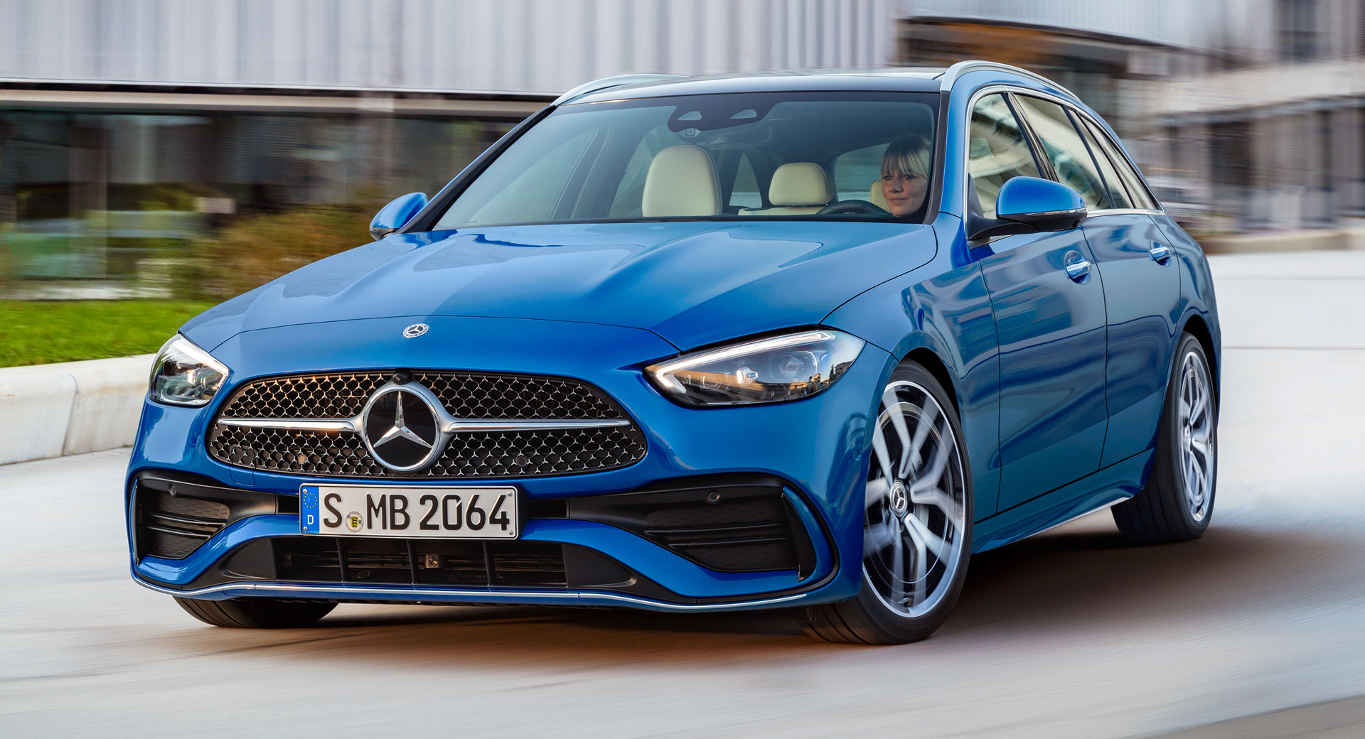 Mercedes C-Class W206 estate front three-quarter in AMG Line trim