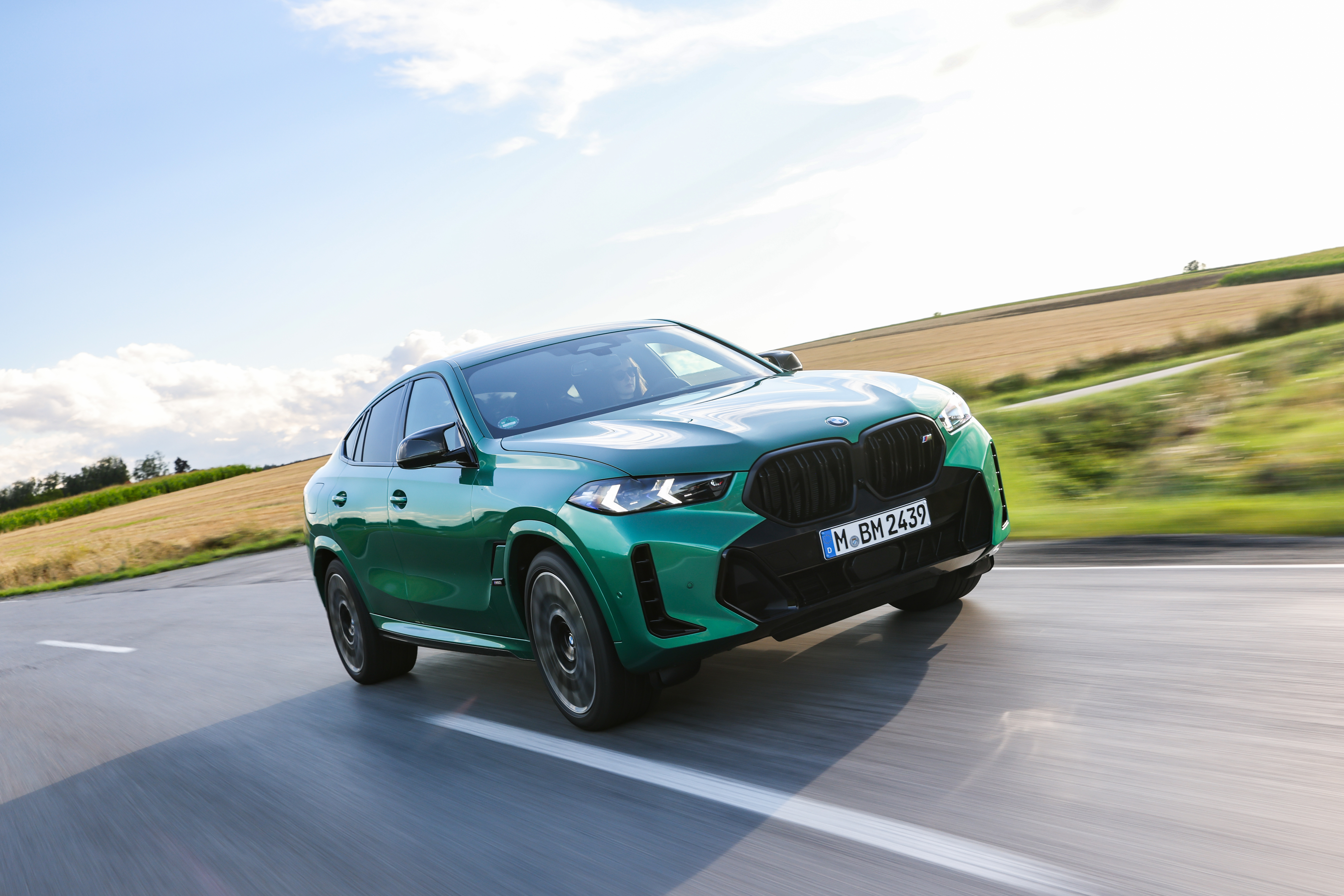BMW X6 M60i depreciation over five years, coupe SUV side profile