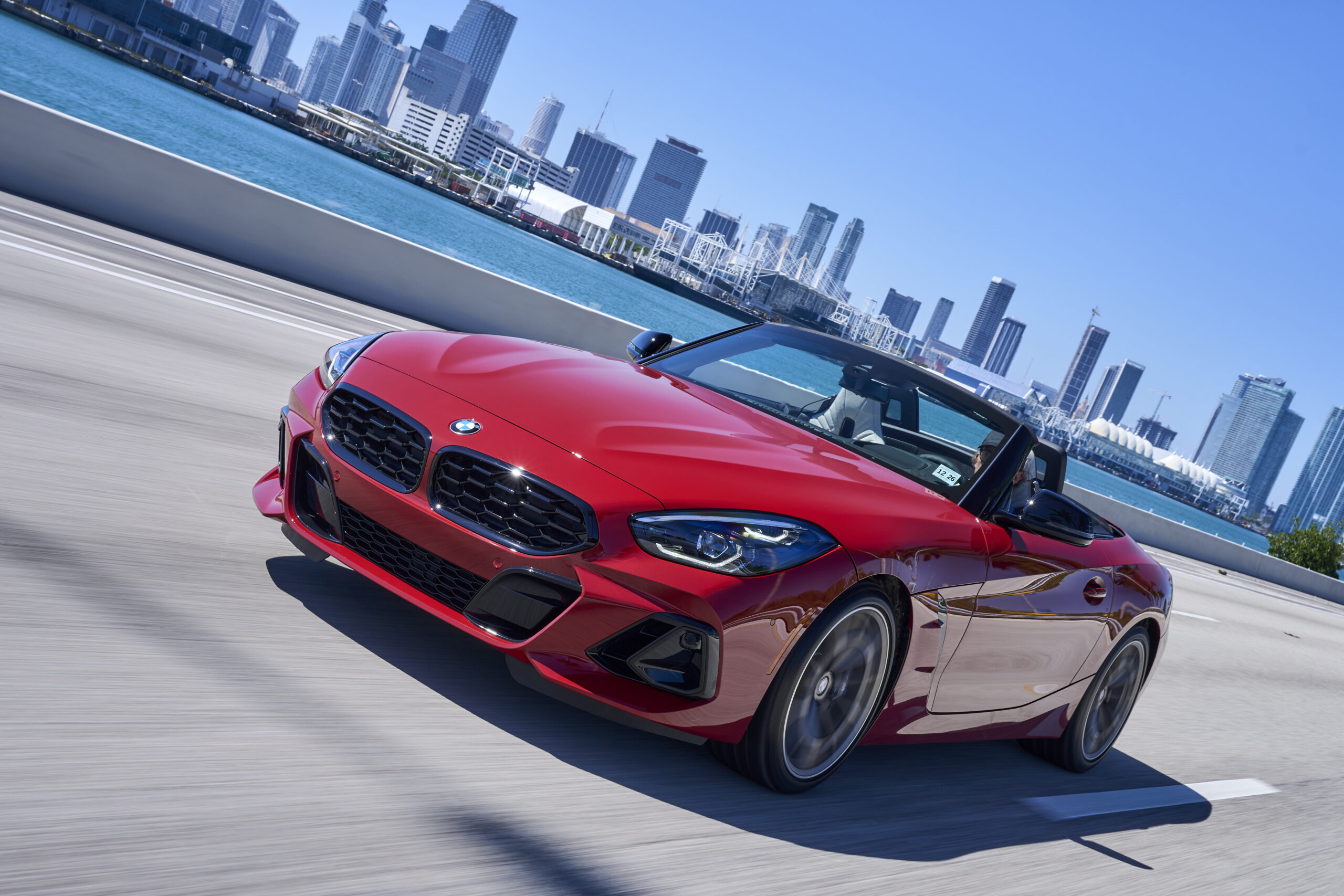 BMW Z4 G29 used M40i in red driving with the roof down