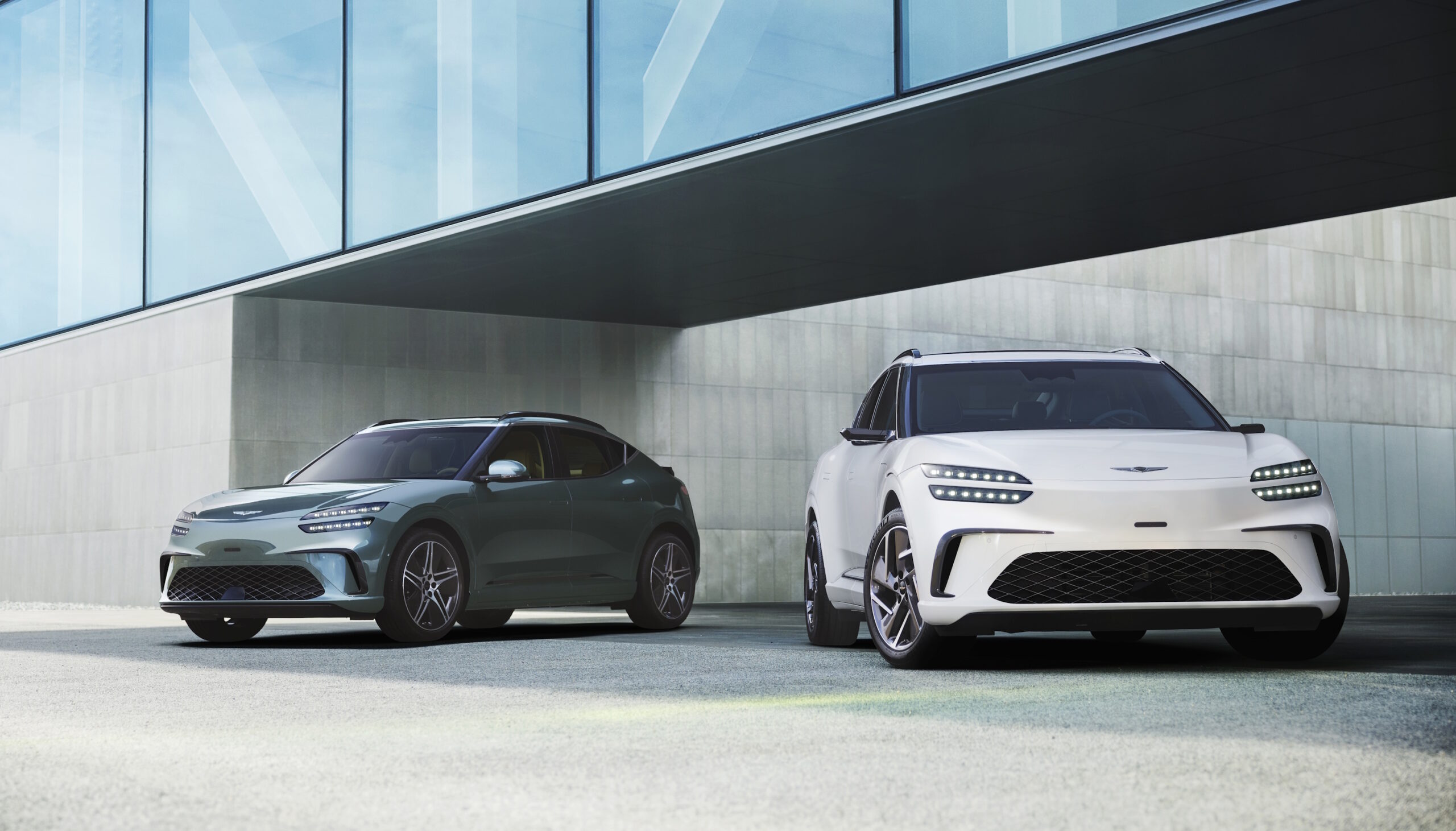 Two Genesis GV60 salary sacrifice models front view