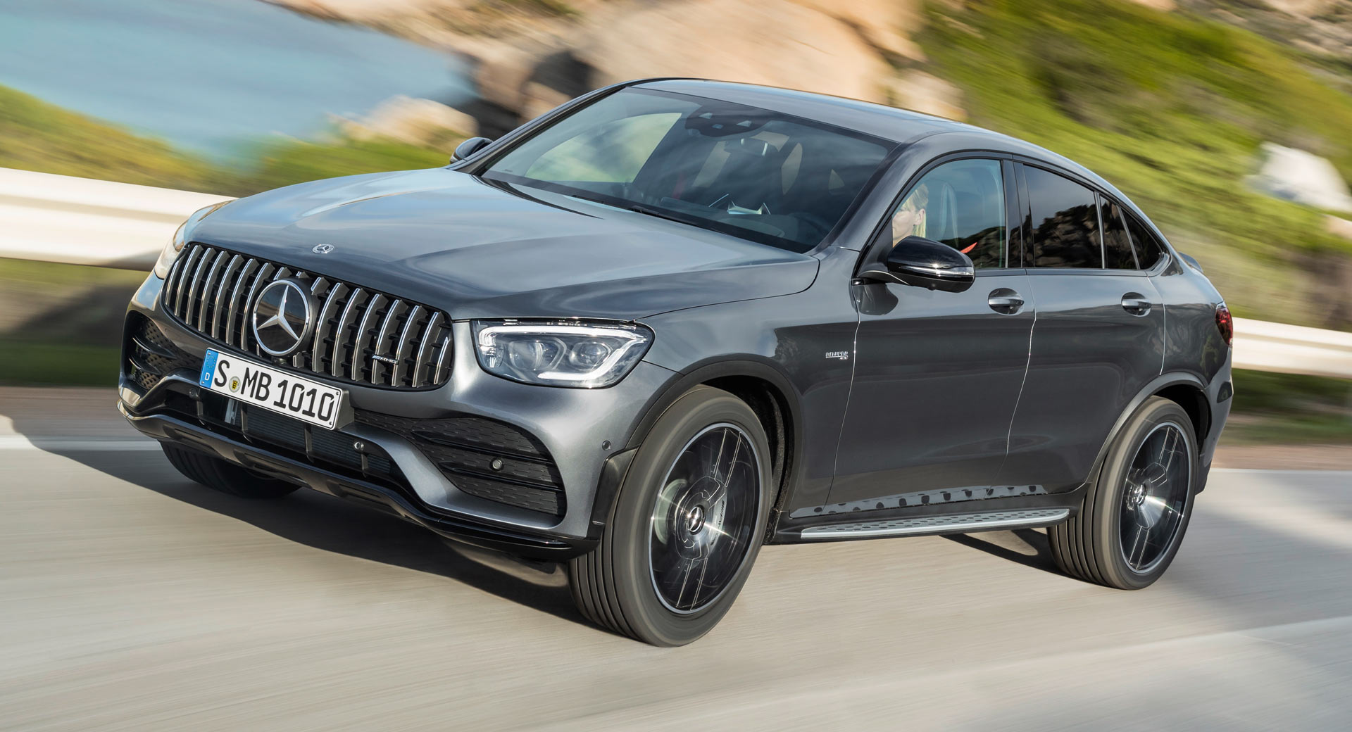 Mercedes-AMG GLC 43 Coupe C253 facelift driving on a coastal road