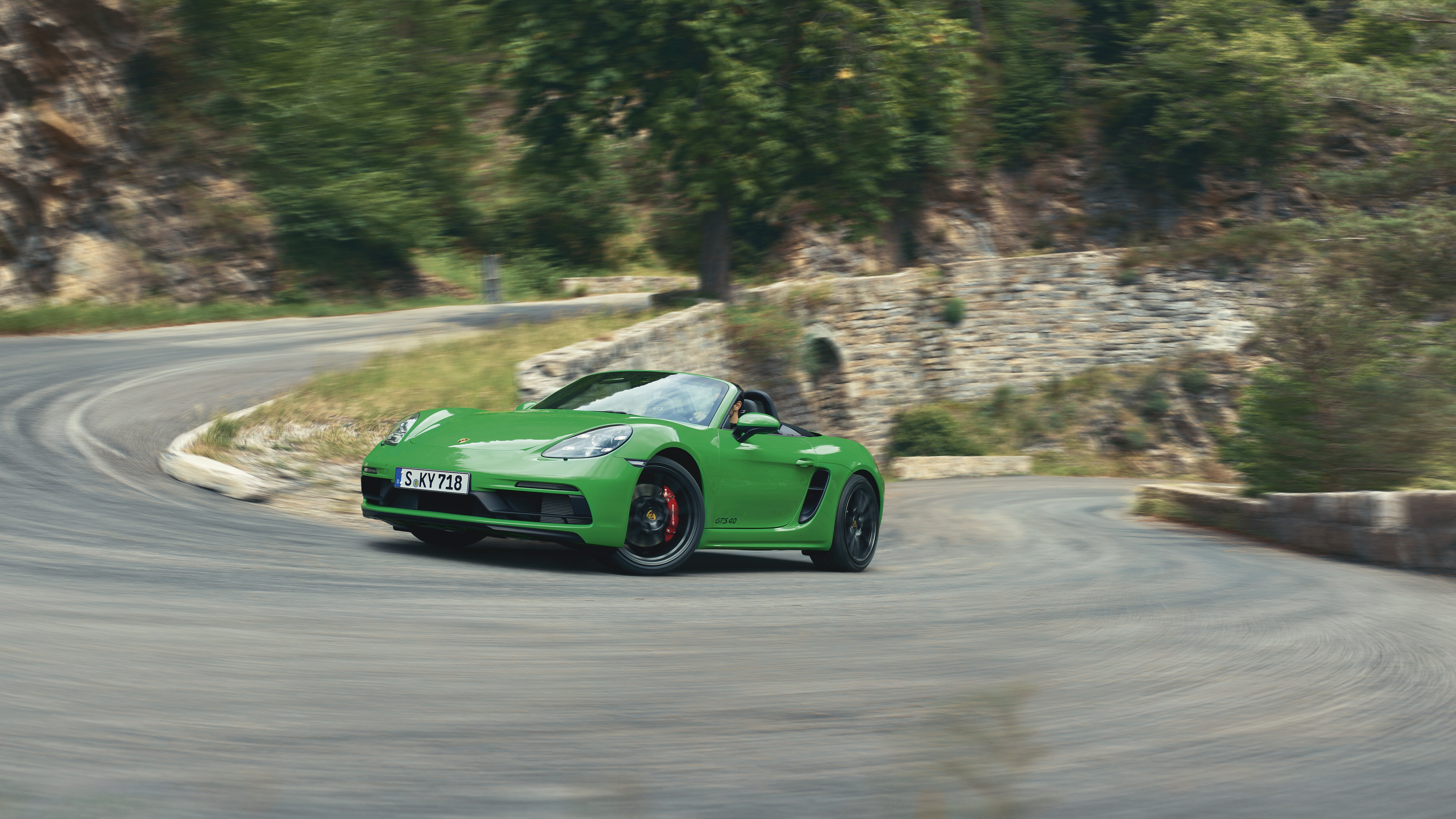 Porsche 718 Boxster GTS 4.0 with the roof down, a used convertible alternative to the Cayman