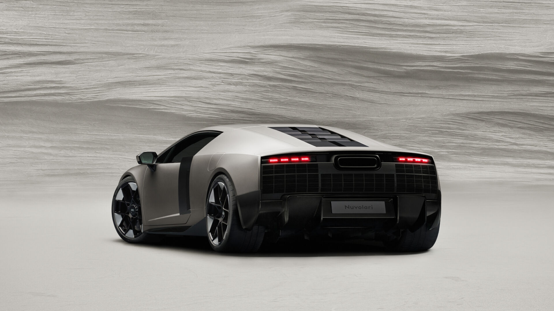Audi Nuvolari V8 hybrid supercar rear three-quarter studio shot