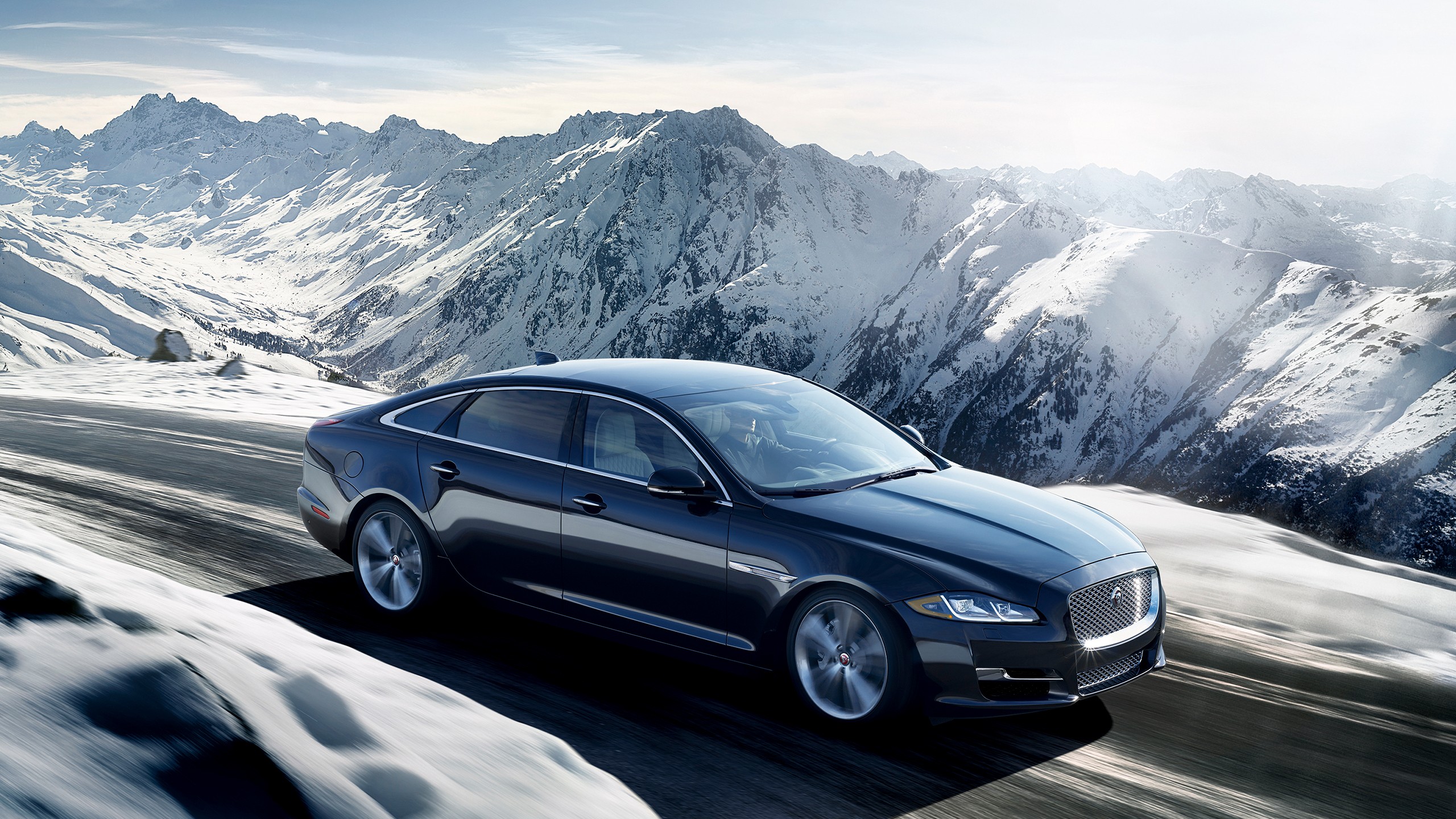 Jaguar XJ X351 used saloon on a mountain road