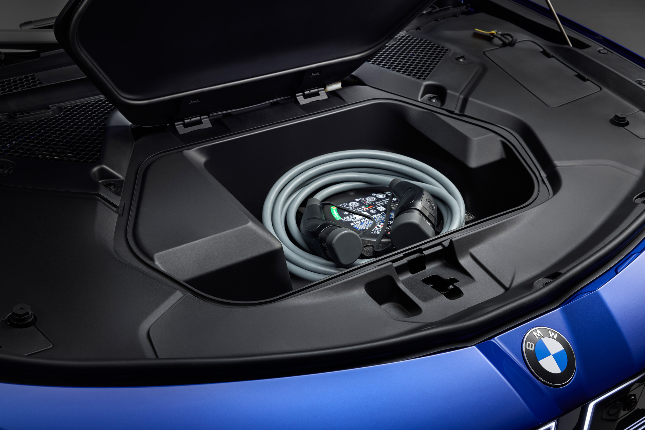 BMW i3 electric 3 Series front storage compartment holding the charging cable