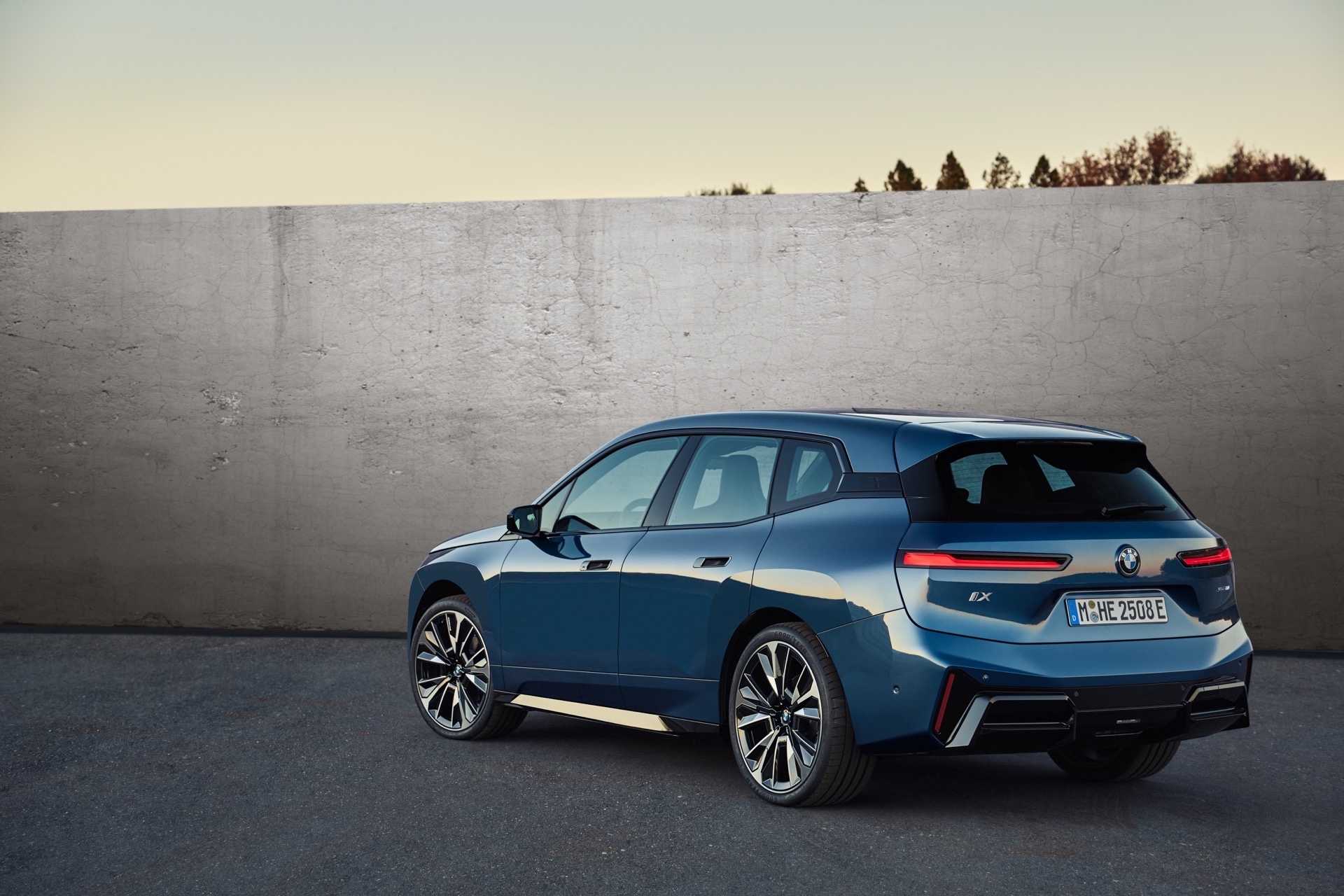 BMW iX rear three-quarter parked, a premium EV salary sacrifice option for higher earners