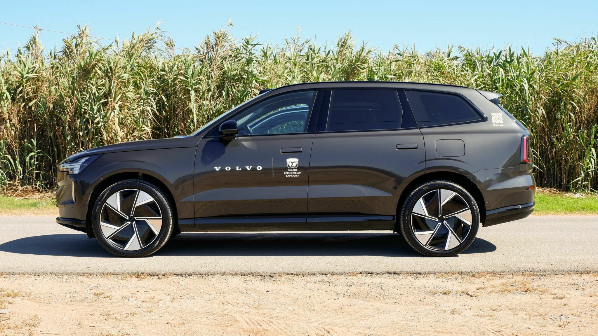 Volvo SUV rear three-quarter press shot, premium car early settlement context