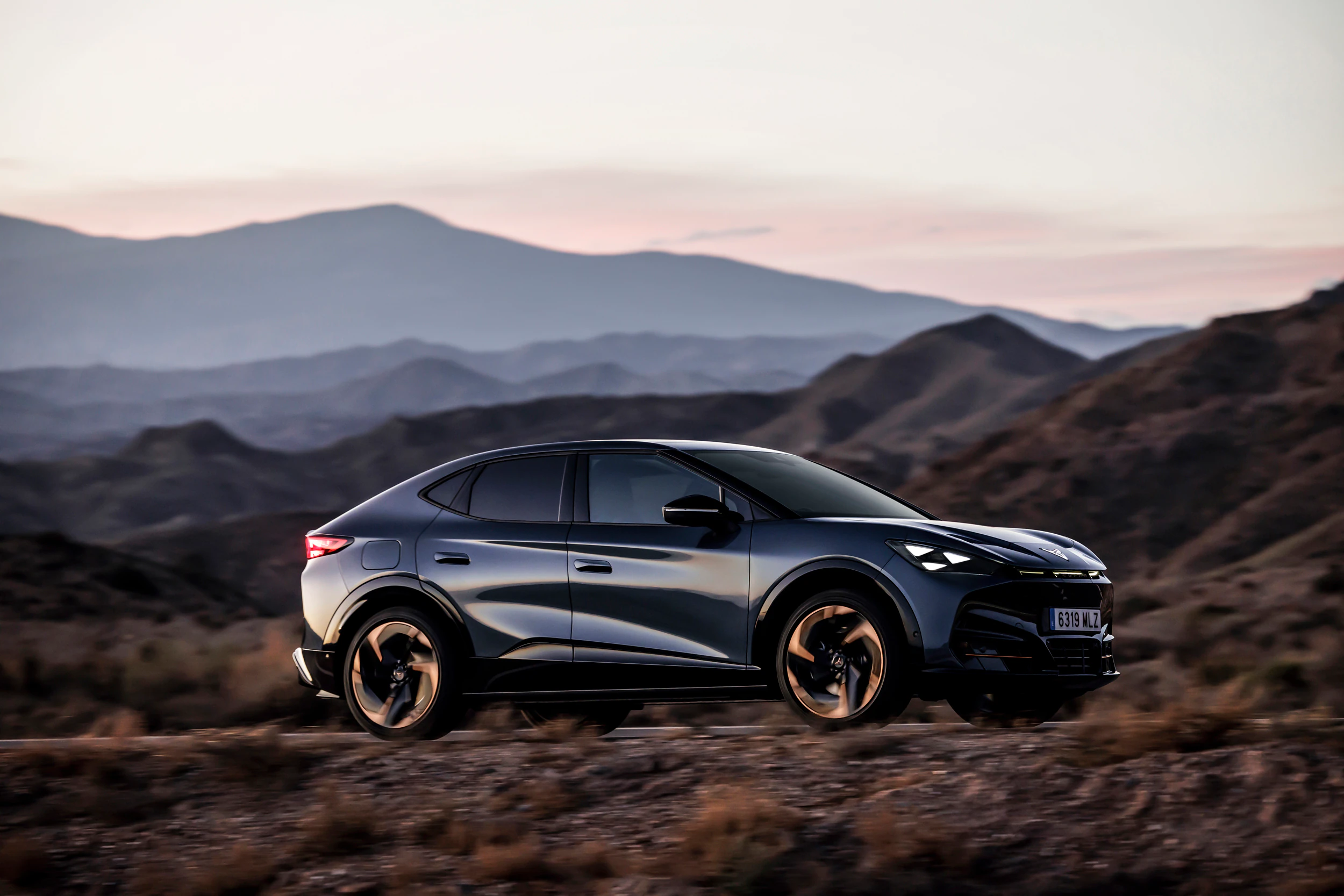 Cupra Tavascan salary sacrifice electric SUV rear three-quarter