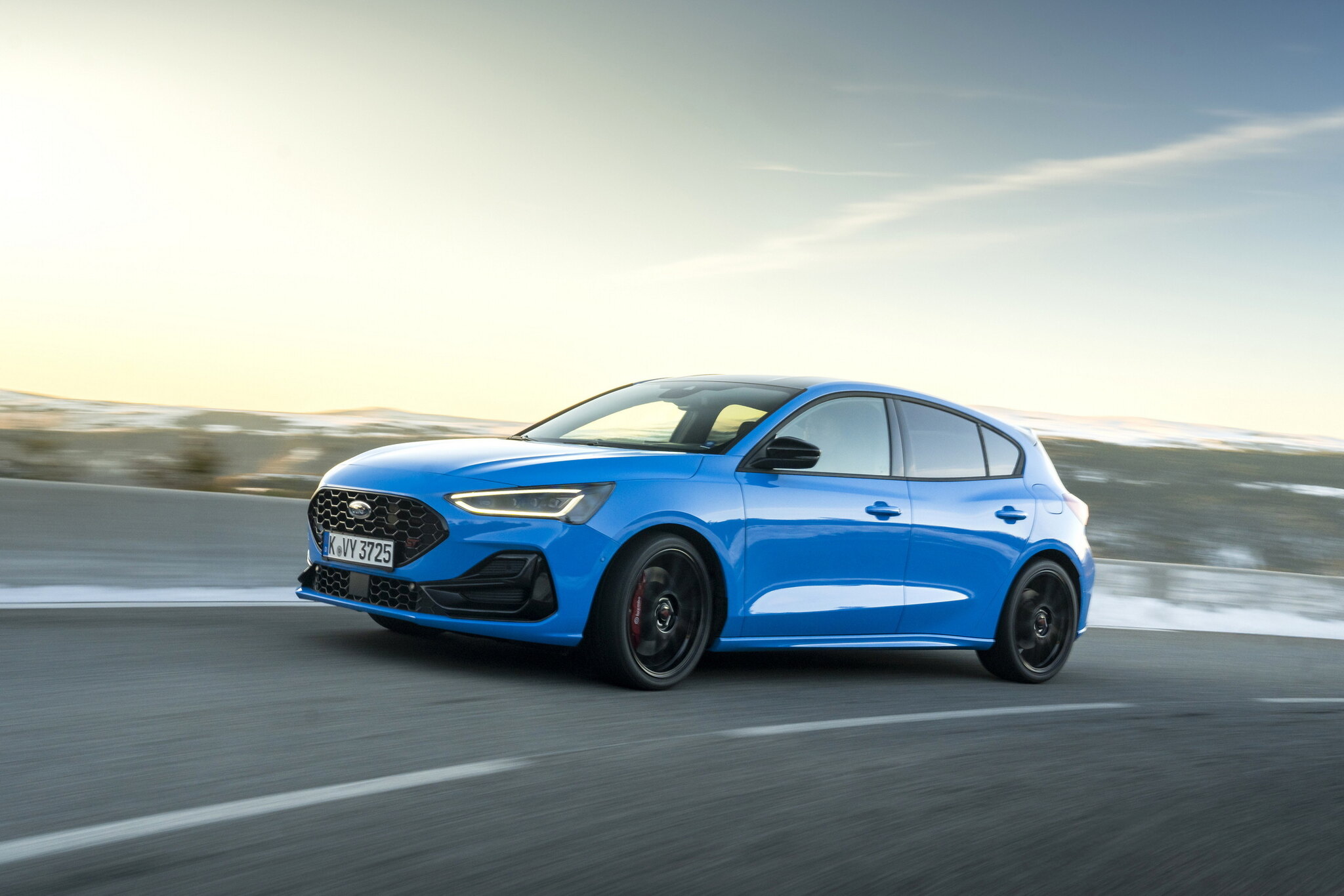 Ford Focus on a winter road, the run-out Motability hatchback