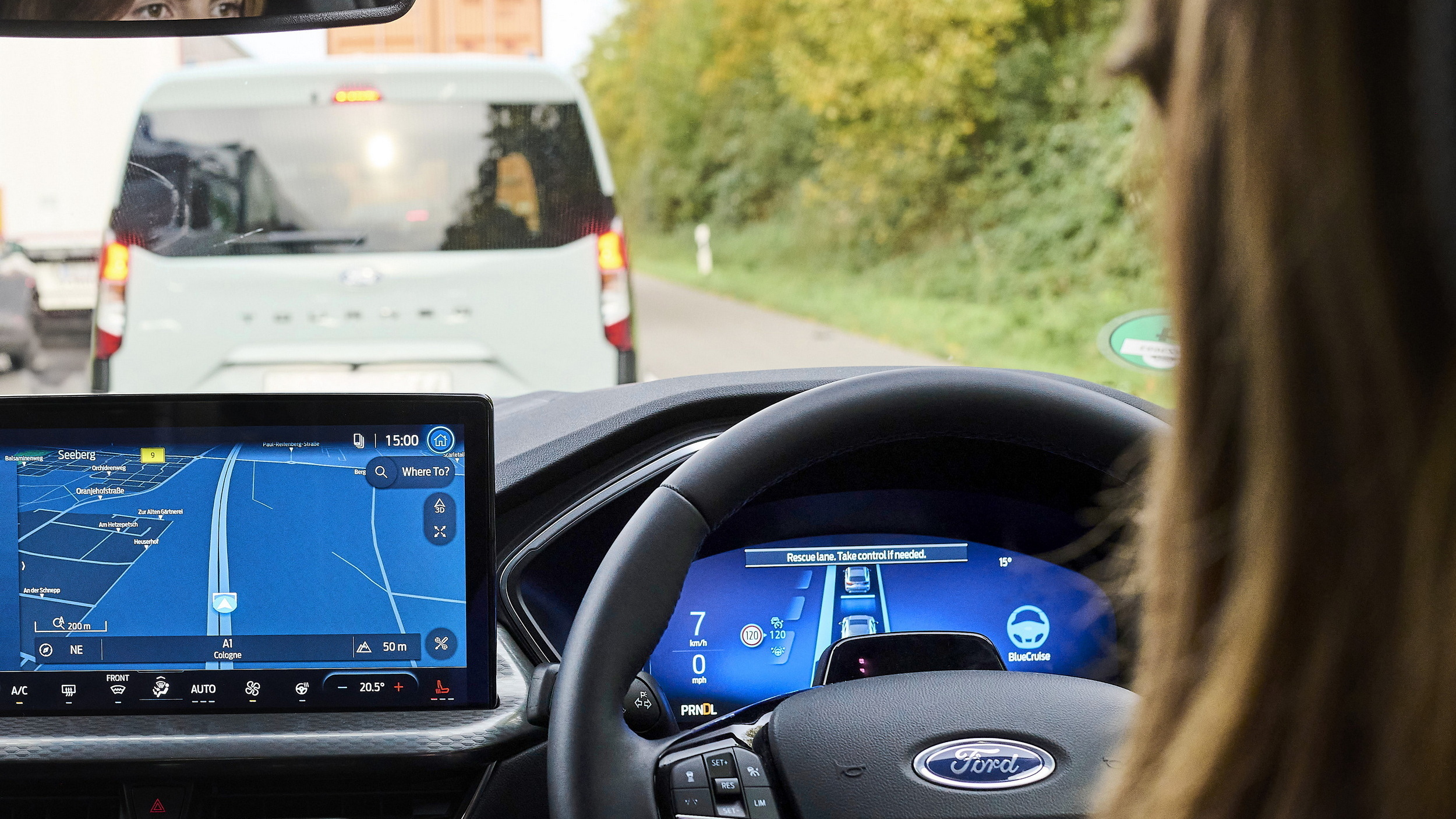 Ford Kuga PHEV digital dashboard and navigation in traffic