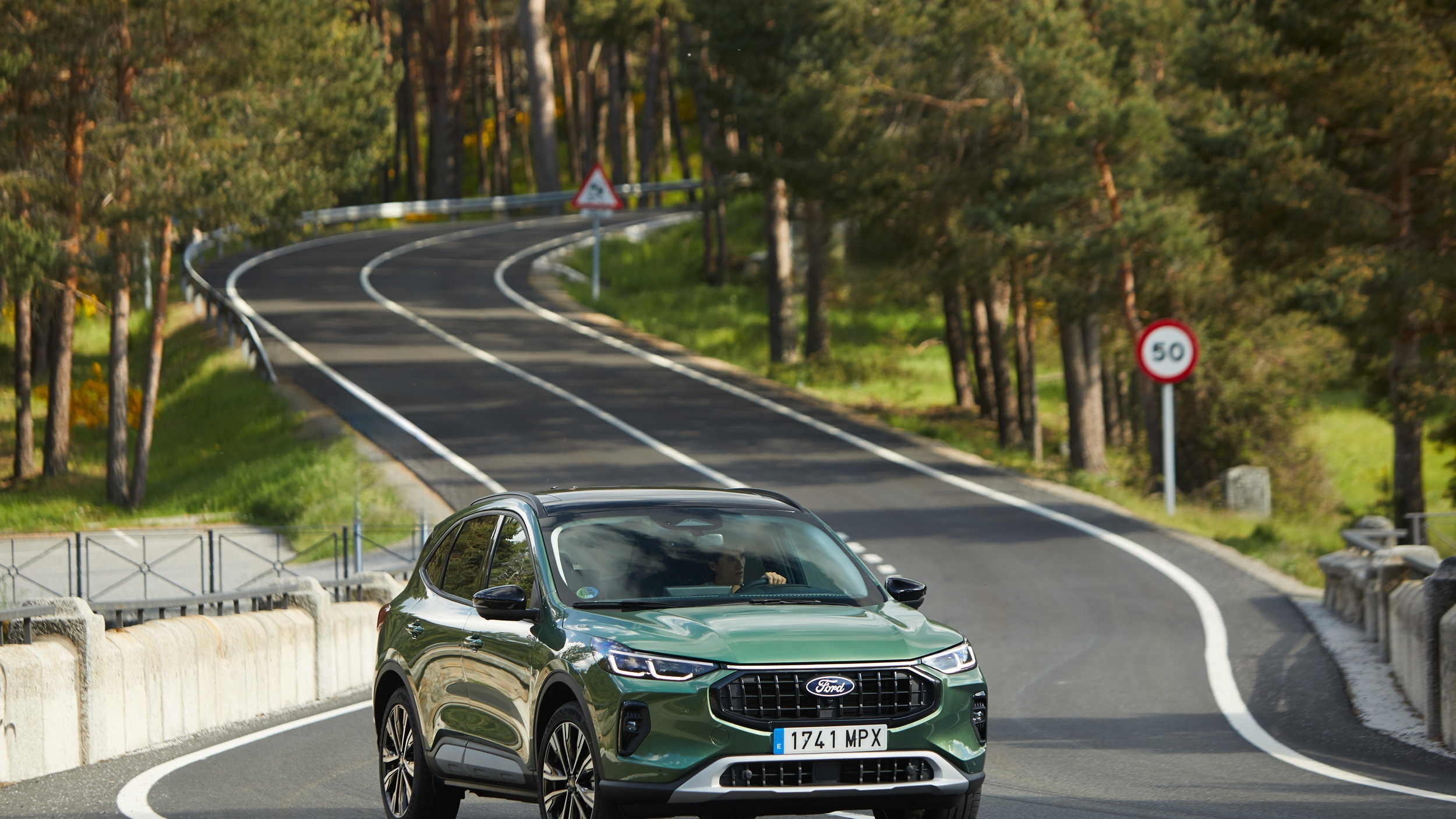 Ford Kuga PHEV running costs on a winding road