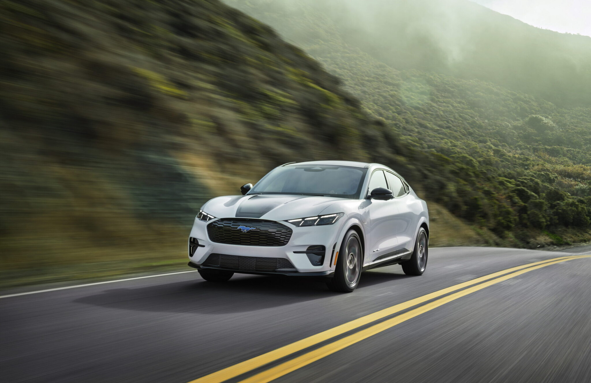 Ford Mustang Mach-E front three-quarter, salary sacrifice vs PCP