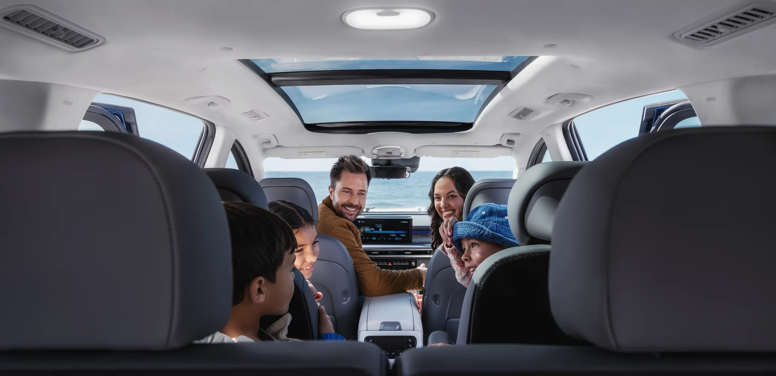 Hyundai Ioniq 9 interior with a family across three rows of seats