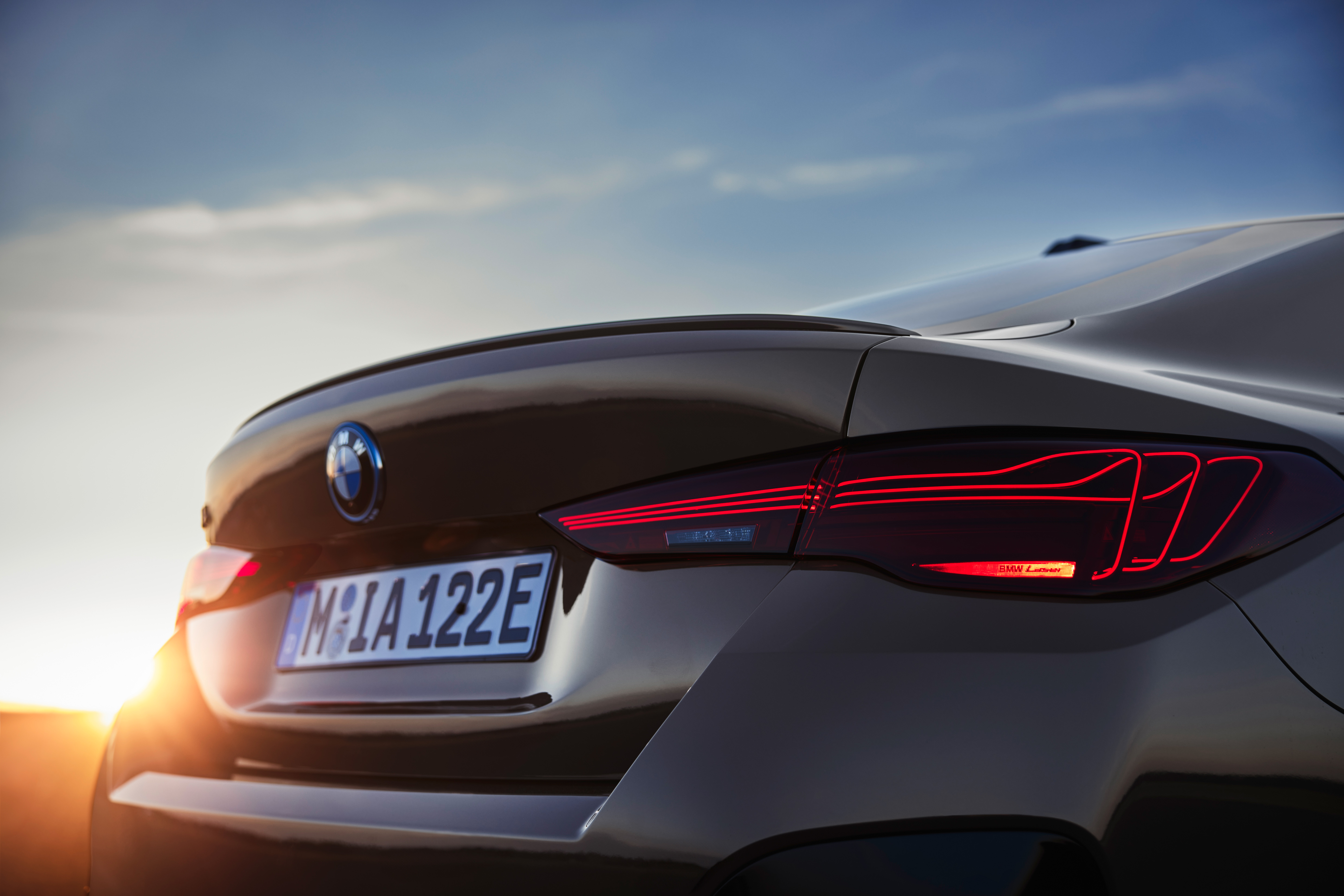 BMW i4 rear tail light and boot detail at sunset