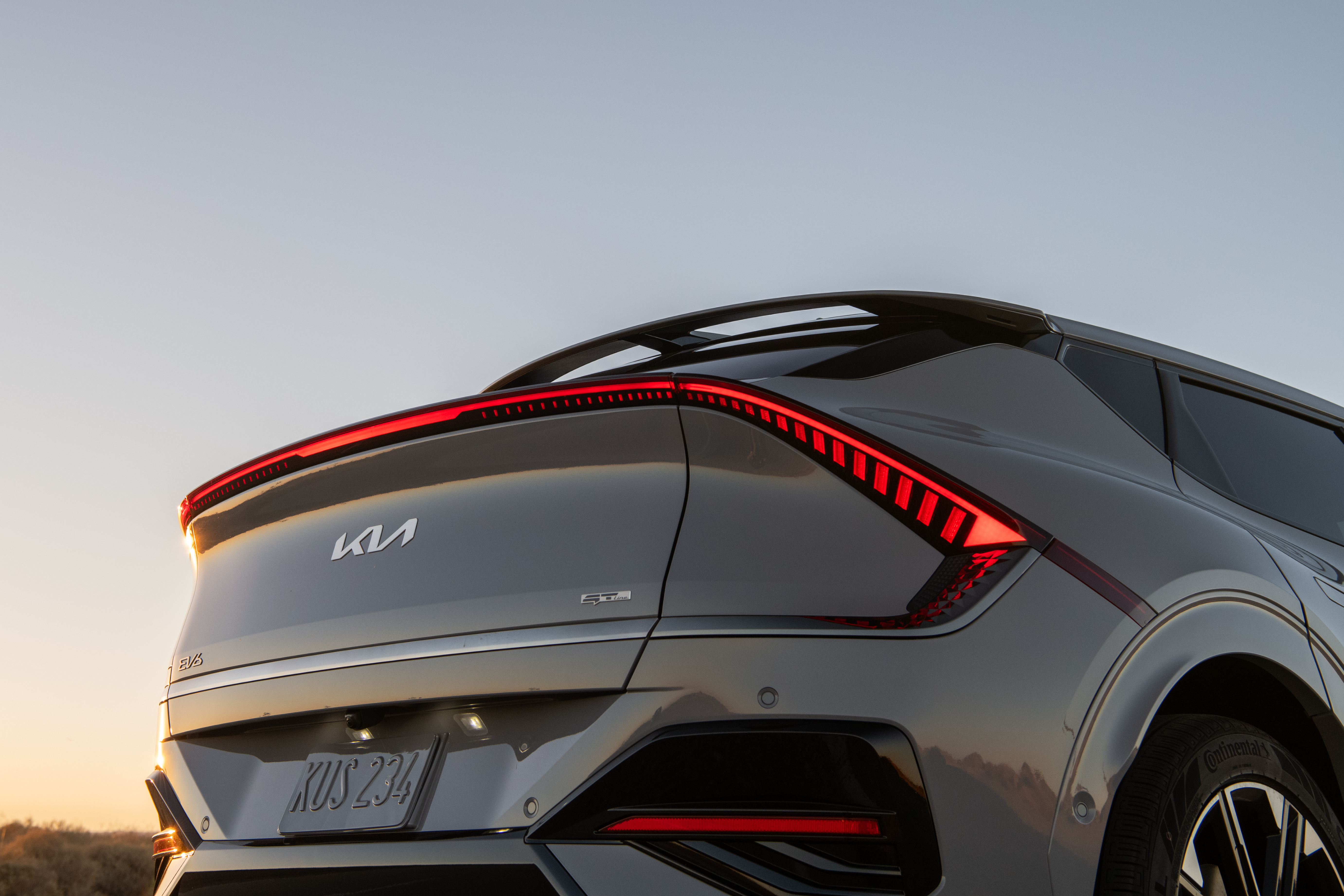 Kia EV6 rear light bar detail, the facelifted car with up to 361 miles WLTP range in 2026