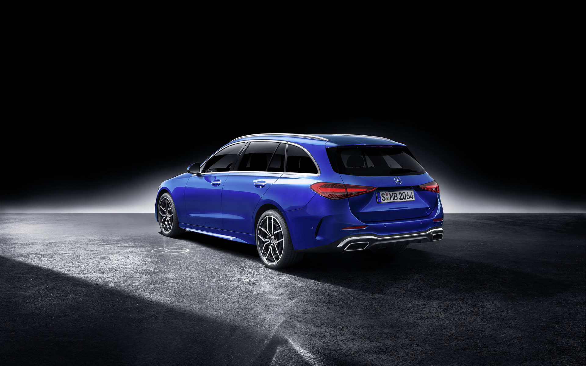 Mercedes C-Class W206 Estate in blue, rear three-quarter studio shot