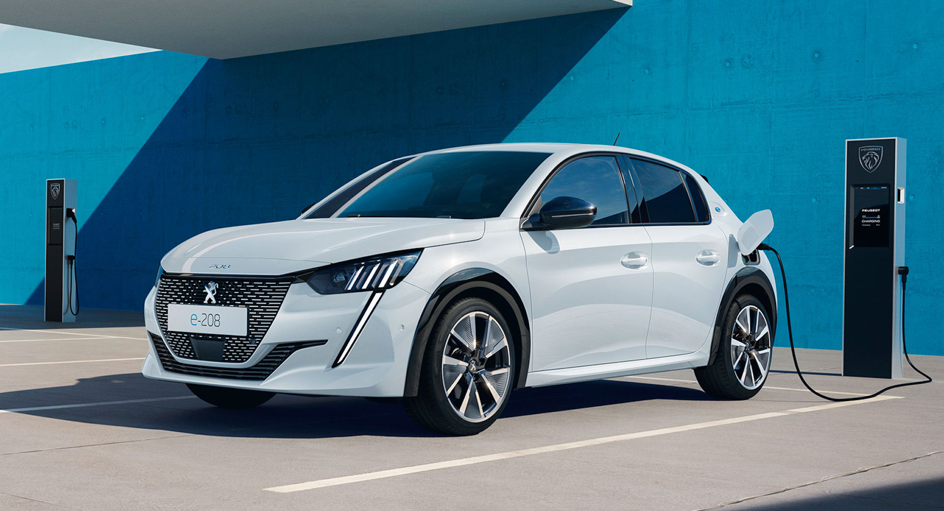 Peugeot e-208 charging at a public EV charger, PCH personal lease route