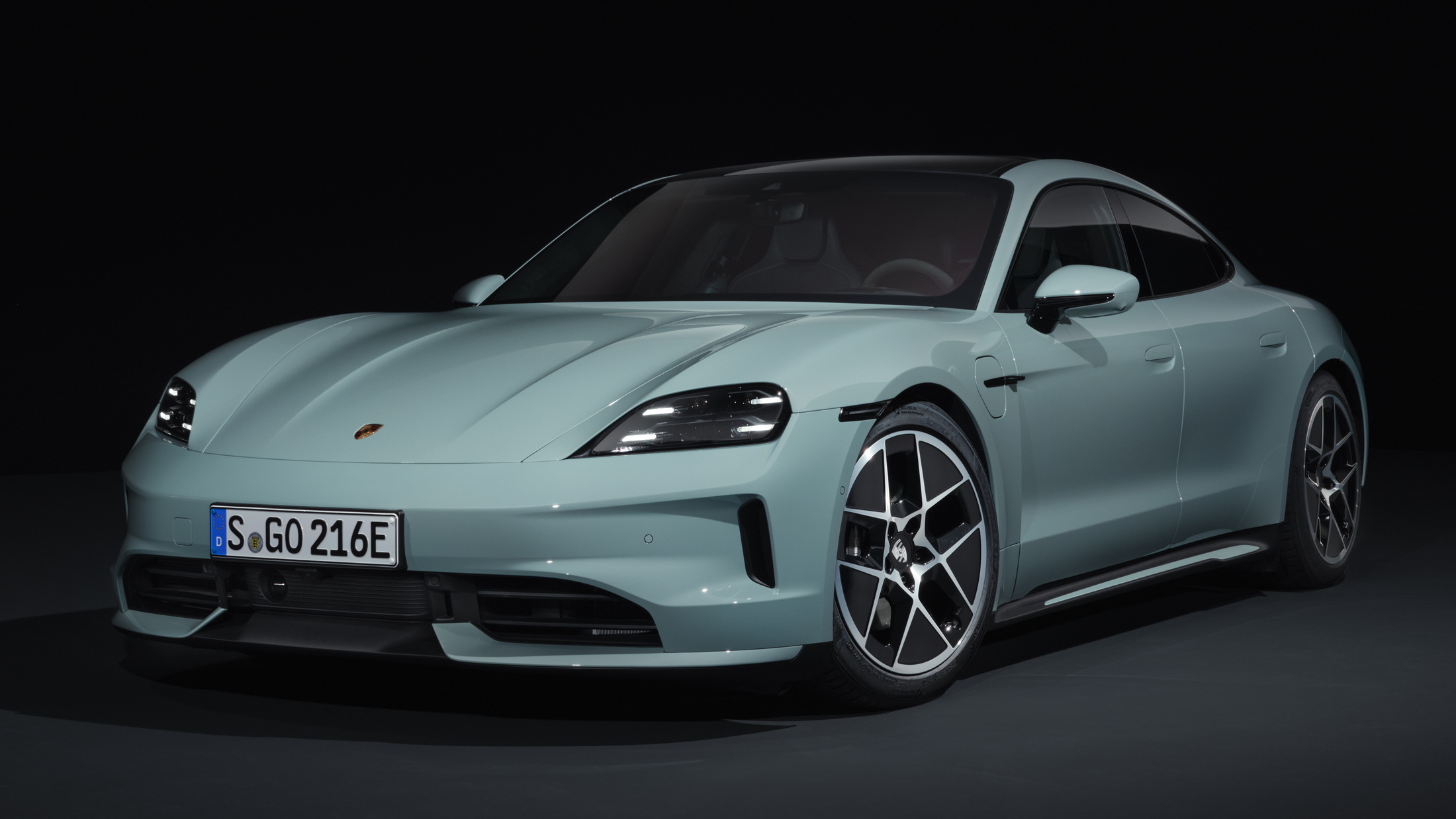 Used Porsche Taycan front three-quarter, Porsche Approved warranty context