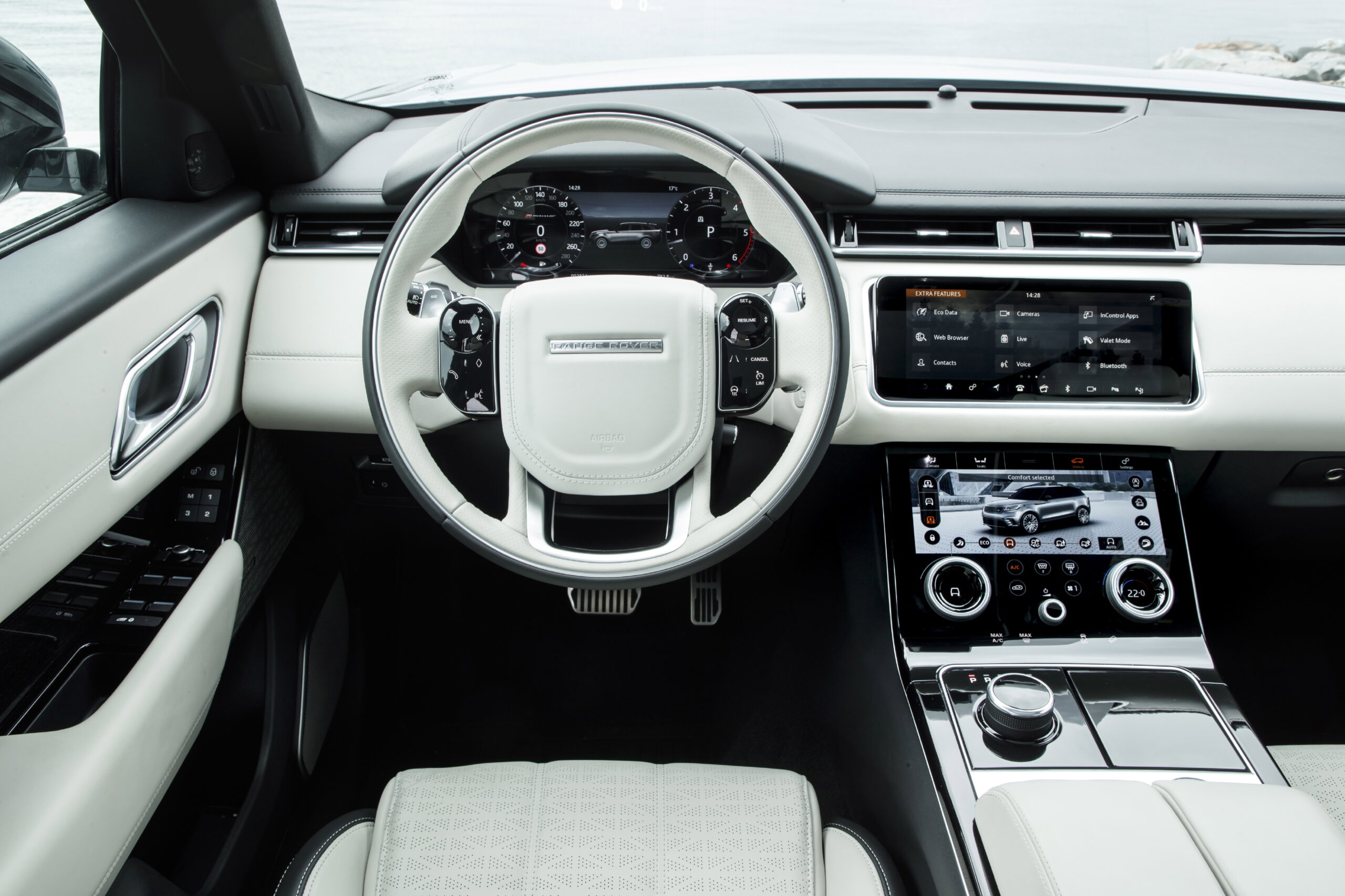 Range Rover Velar interior, premium car finance comparison of APR and deposit contribution