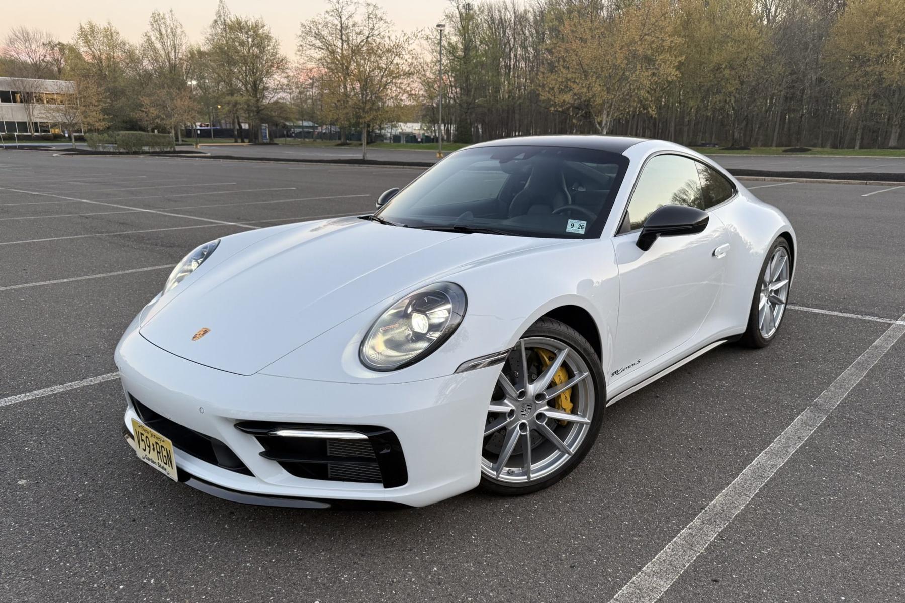 Porsche 911 992 rear three-quarter, condition and history are what separate the cheap cars from the dear ones