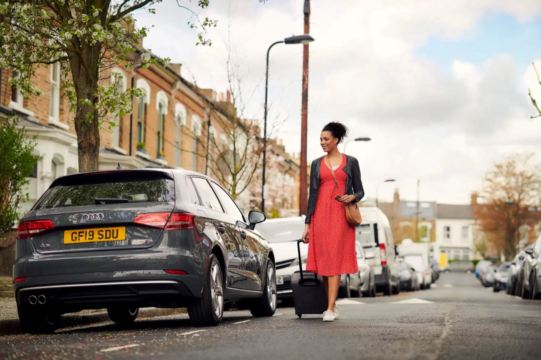 Used executive saloon on a forecourt, approved-used eligibility window