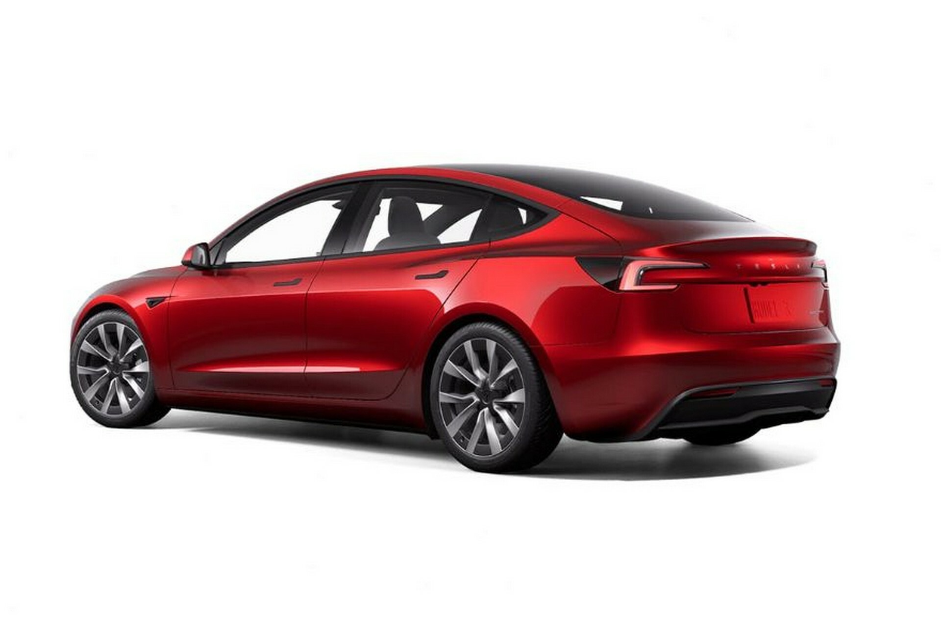 Tesla Model 3 Long Range rear three-quarter studio shot in red