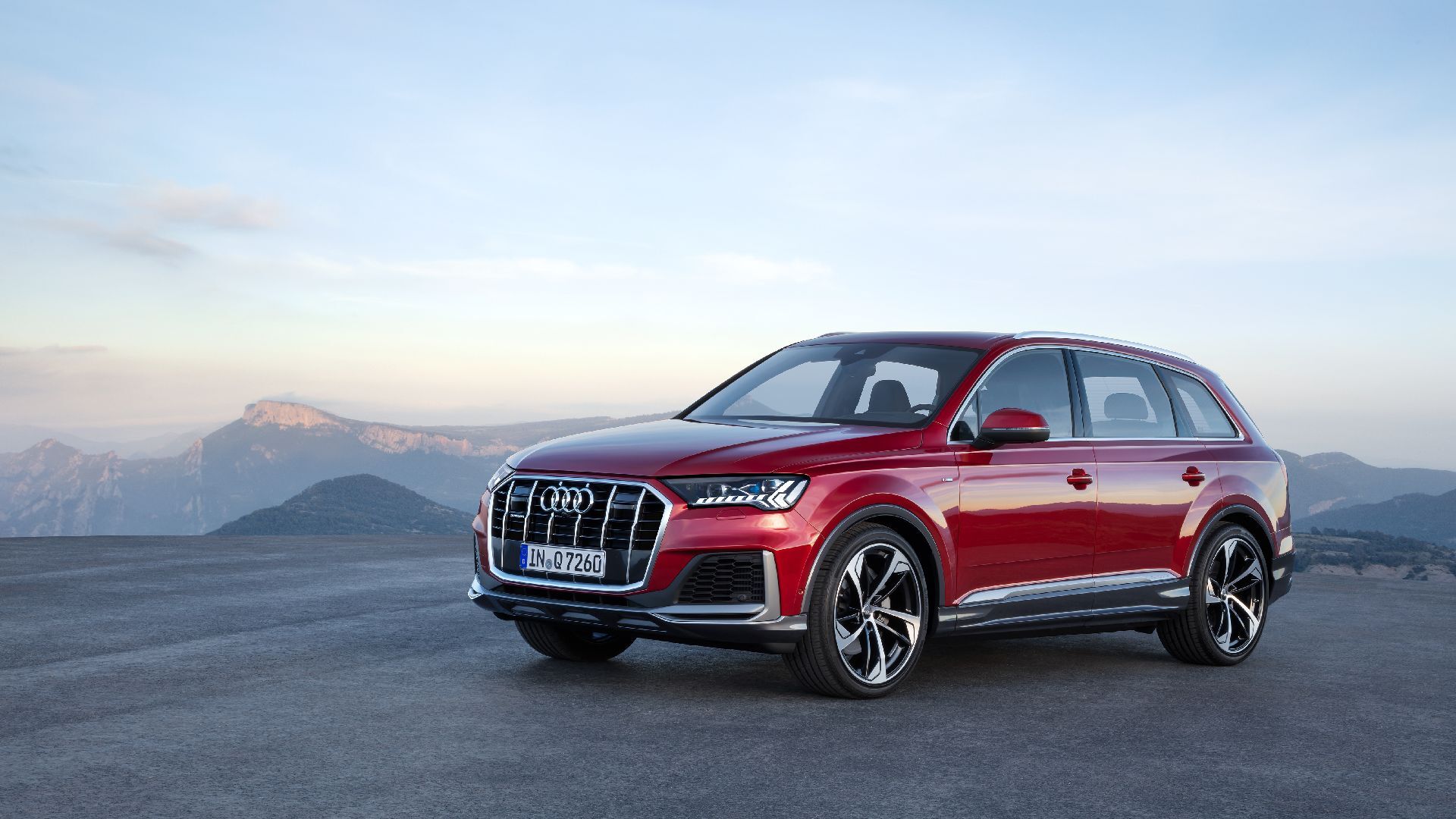 Used Audi Q7 front quarter against mountains, 3-year-old CPO buy